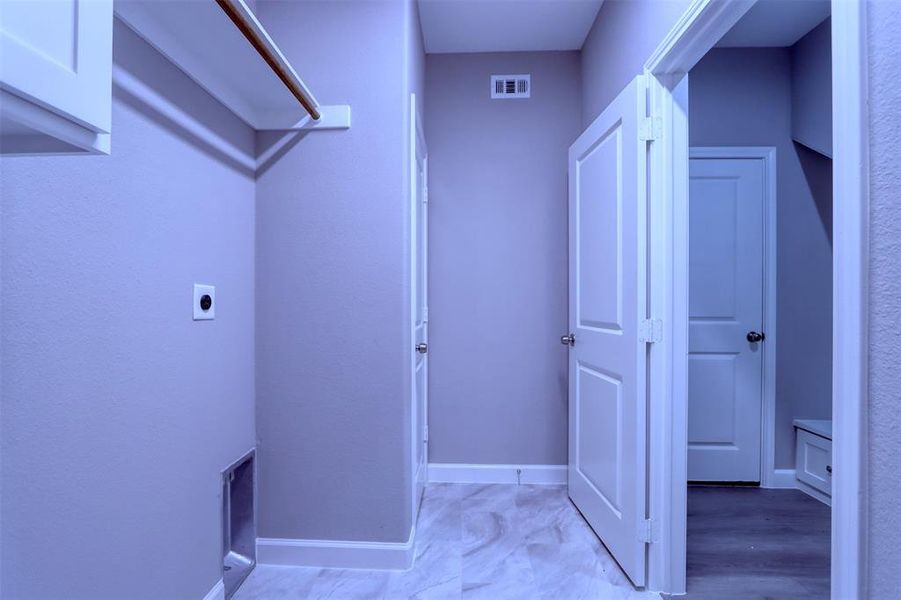 Mudroom outside laundry room.