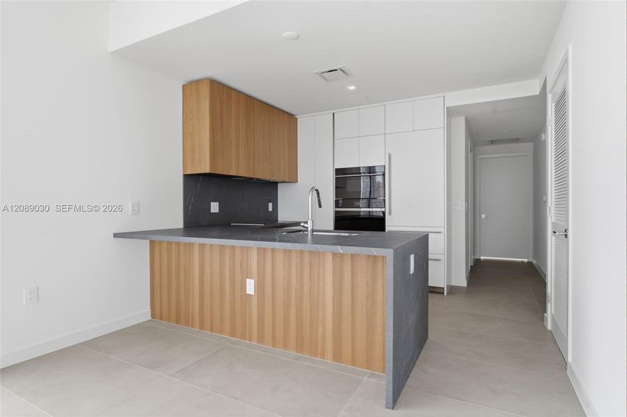 Furnished interior view inside a new home in , Miami (Image 4).
