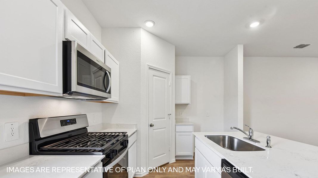 Furnished interior view inside a new home in Wayside, Uhland (Image 8).