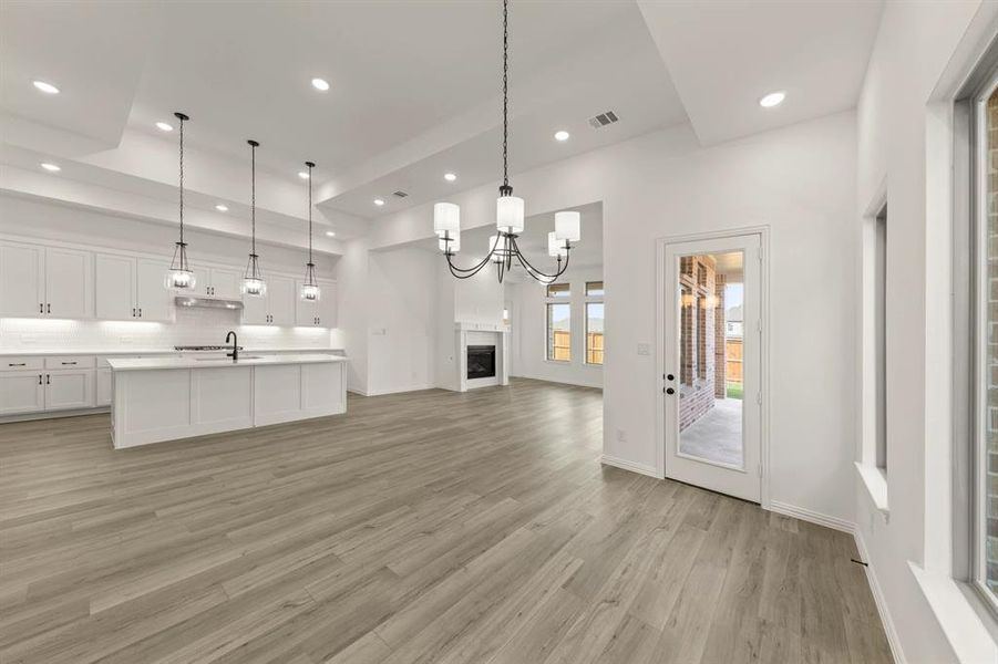 Open Kitchen-Living-Dining Room featuring the Harmony Collection