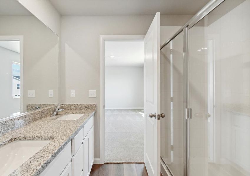 The master bathrom of the Laramie has walk-in, glass showers.