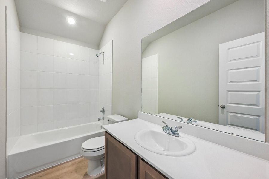 Furnished interior view inside a new home in Granger Pines, Conroe (Image 5).