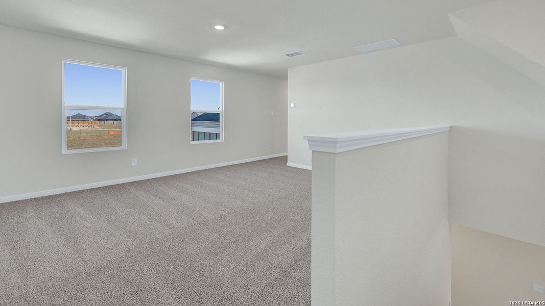 Spacious, unfurnished interior of a new home in Paramount, Kyle (Image 24).
