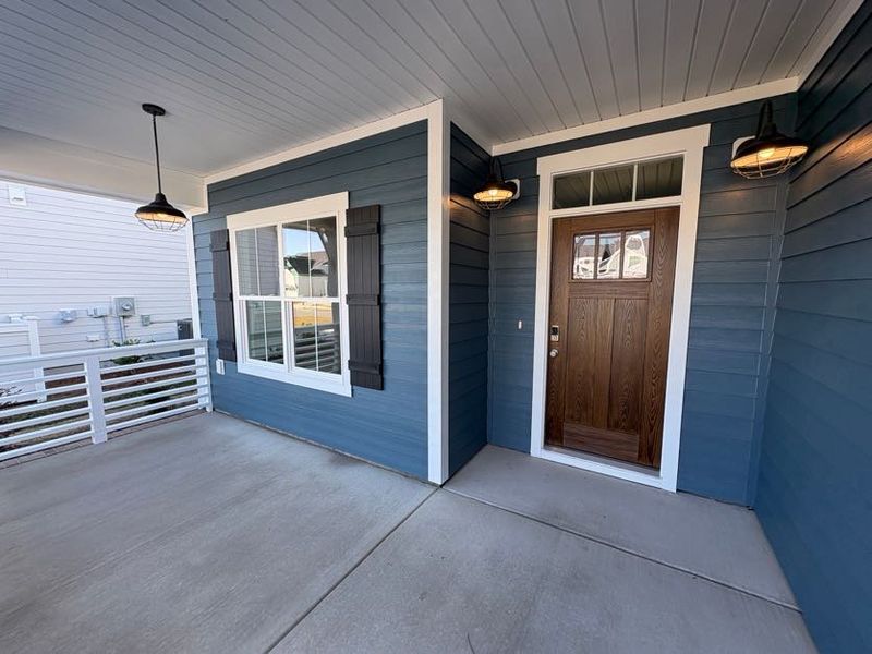 Exterior details and patio area of a home in Riverside Cove, Wilmington (Image 3).