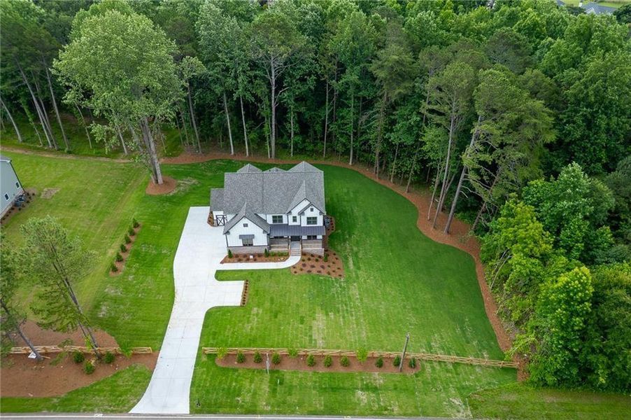 Front exterior of a new home in , Cumming, GA, highlighting curb appeal (Image 27). Front exterior of a new home in , Cumming, GA, highlighting curb appeal (Image 27).