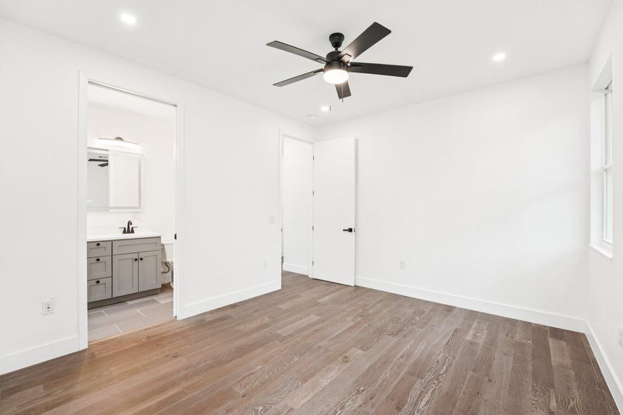 Primary bedroom and bathroom Primary bedroom and bathroom