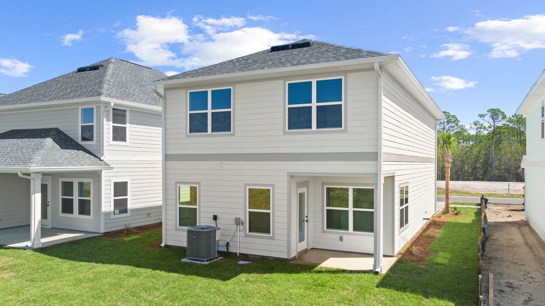 Exterior details and patio area of a home in Colonial East, Panama City Beach (Image 21).