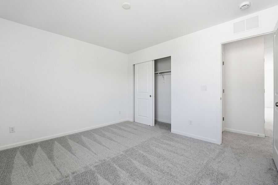 Spacious, unfurnished interior of a new home in Trailstone, Arvada (Image 19).
