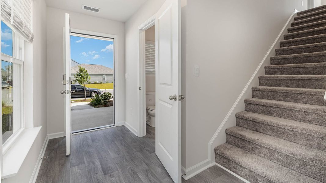 Representative furnished interior of a home built from the WREN by D.R. Horton in Cedar Hill Landing, Navassa (Image 8).