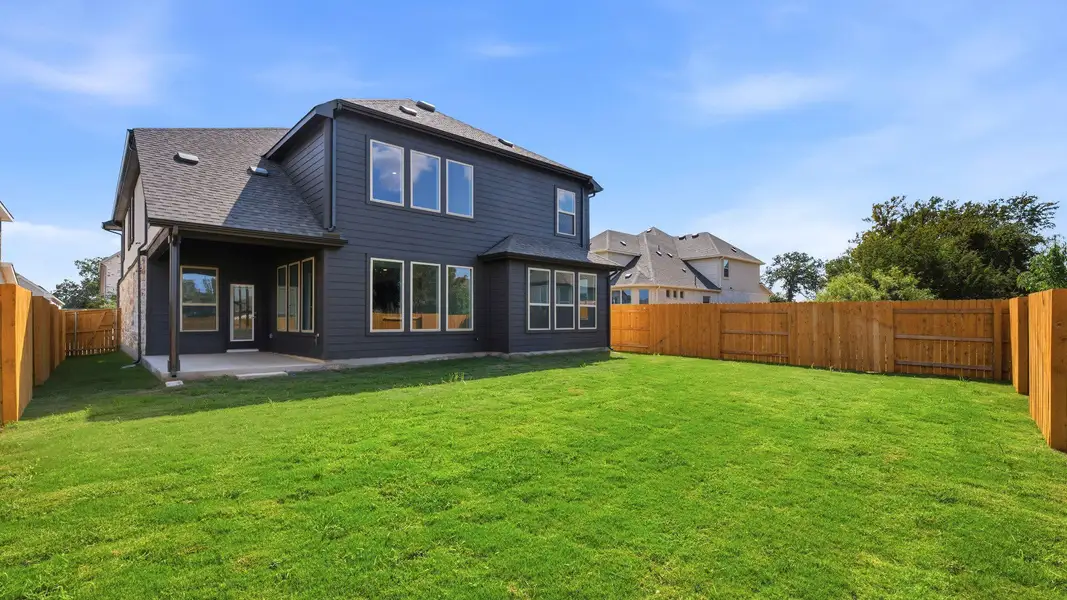 Exterior details and patio area of a home in Oaks at San Gabriel, Georgetown (Image 4).
