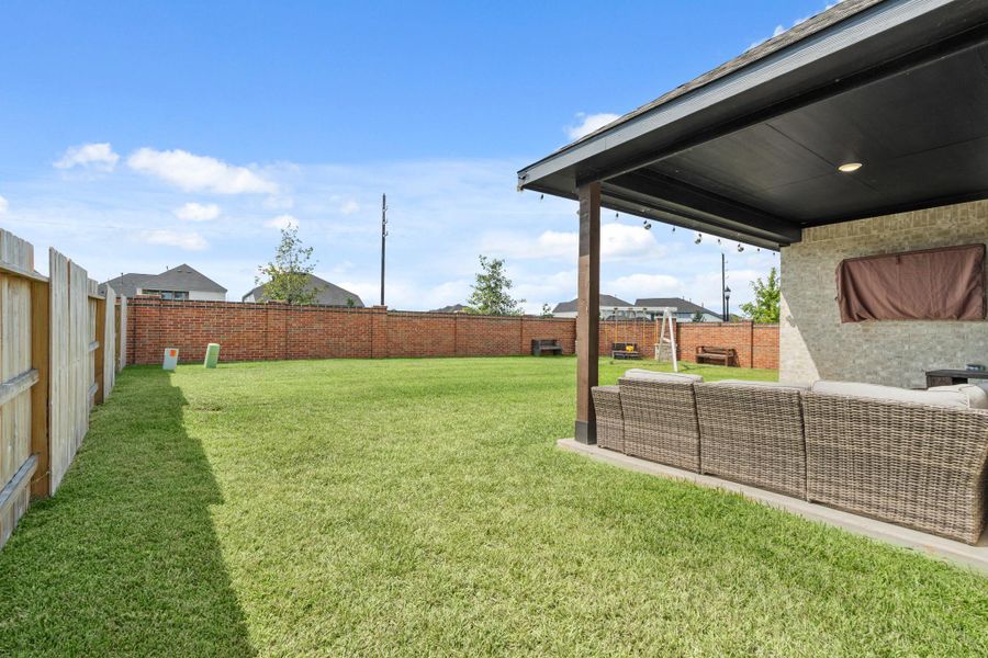 This home offers plenty of privacy with no back neighbors and only one side neighbor! It's finished with a brick privacy fence