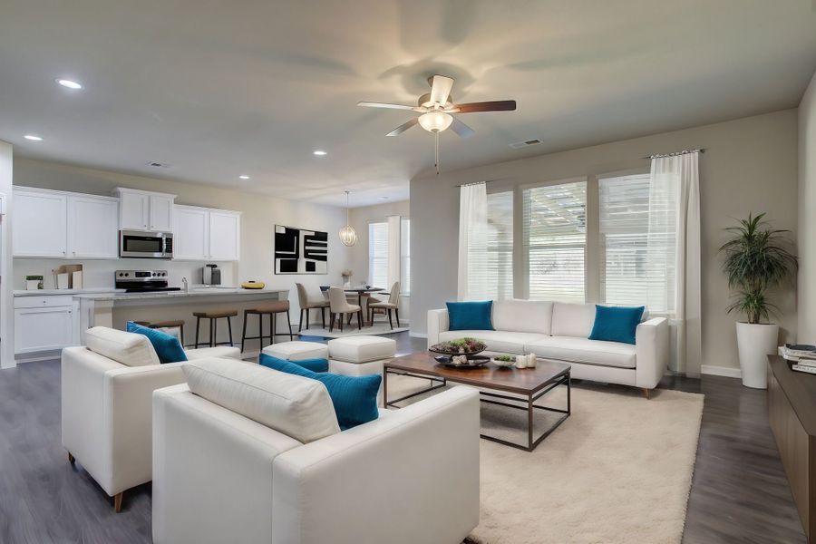 The spacious kitchen and dining area open to the family room for easy entertaining