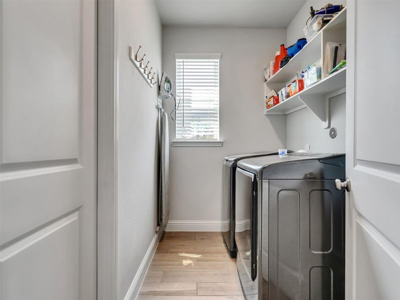 Laundry connects to the primary bathroom and closet