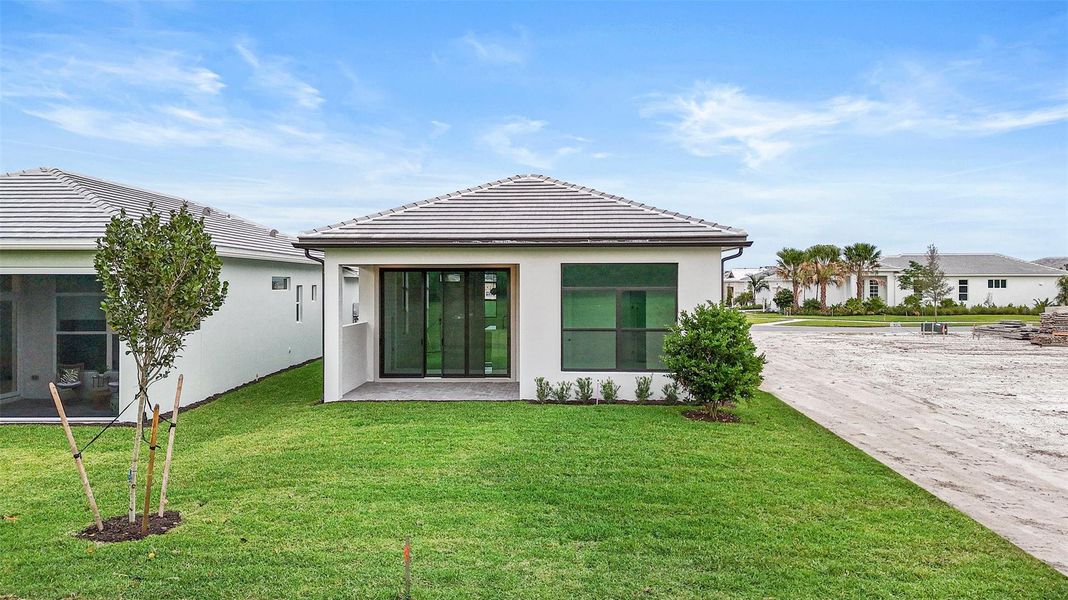 Exterior details and patio area of a home in Cresswind Palm Beach at Westlake, Westlake (Image 22). Exterior details and patio area of a home in Cresswind Palm Beach at Westlake, Westlake (Image 22).