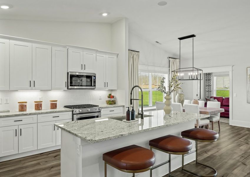 The centerpiece of the kitchen is the oversized island.