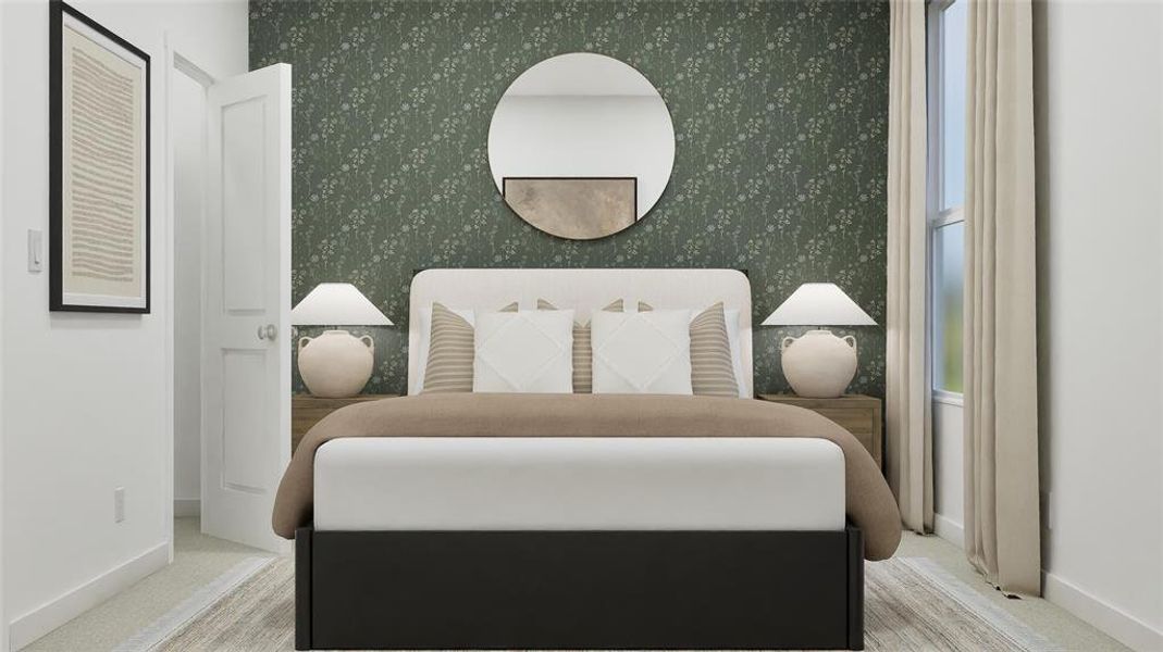 Carpeted bedroom featuring baseboards