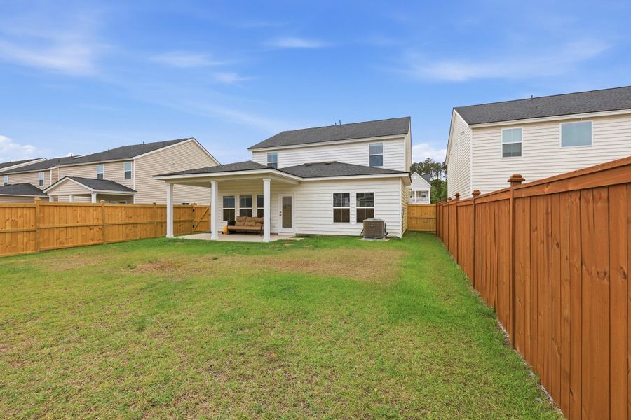 Exterior details and patio area of a home in Heron's Walk at Summers Corner, Summerville (Image 4).