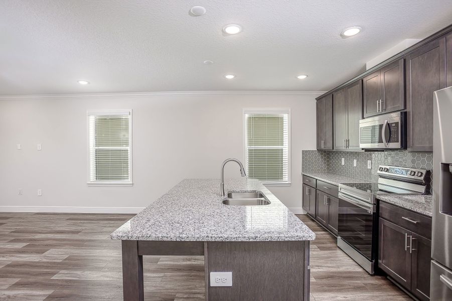 Representative furnished interior of a home built from the Carrington by Maronda Homes in Malabar Springs, Palm Bay (Image 5).