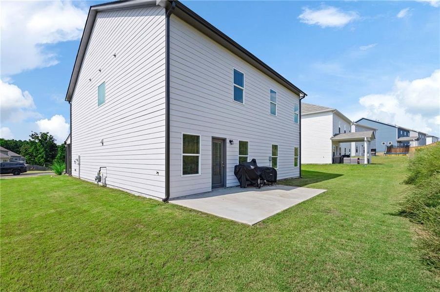Front exterior of a new home in , Dallas, GA, highlighting curb appeal (Image 22).