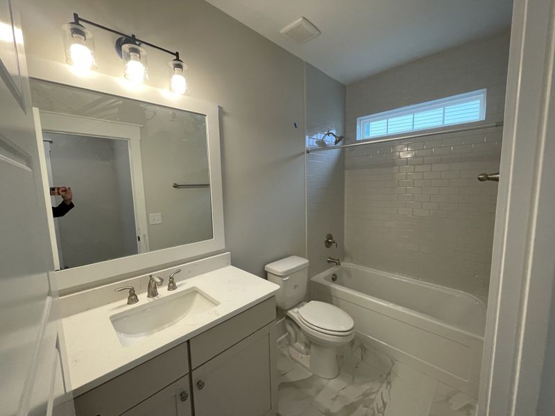Furnished interior view inside a new home in The Sanctuary at Sunset Beach, Sunset Beach (Image 13).