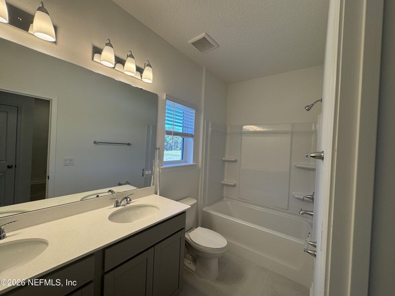 Furnished interior view inside a new home in Hyland Trail, Green Cove Springs (Image 5).