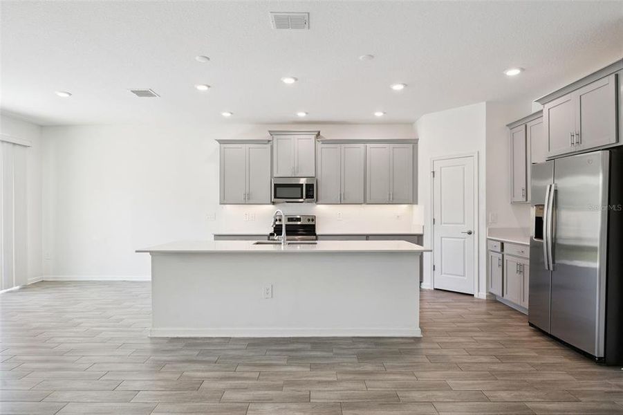 Furnished interior view inside a new home in Pine Glen: Chateau Collection, St. Cloud (Image 10).