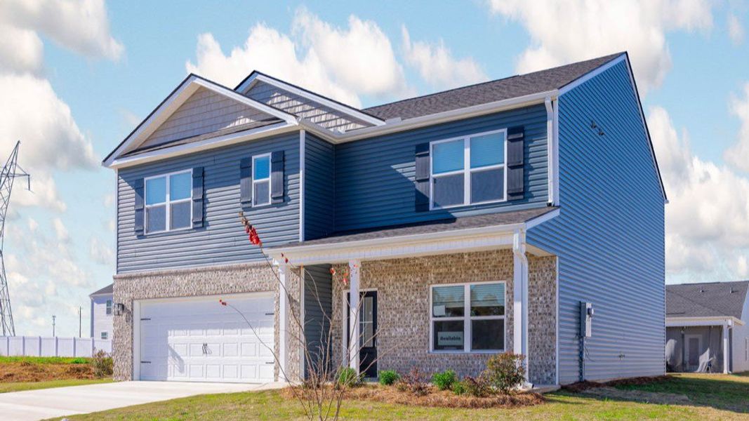 Front exterior of a new home in Lone Oaks Farm, Cleveland, TN, highlighting curb appeal (Image 2). Front exterior of a new home in Lone Oaks Farm, Cleveland, TN, highlighting curb appeal (Image 2).