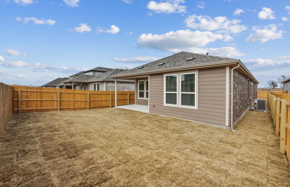 Exterior details and patio area of a home in Crosswinds, Kyle (Image 22).