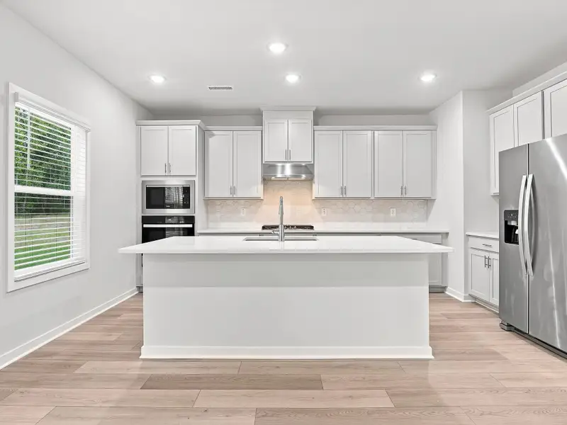 Furnished interior view inside a new home in The Heritage at Buffaloe Reserve, Raleigh (Image 3).