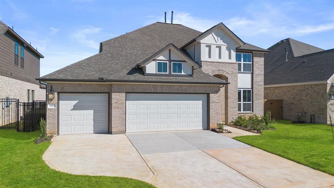 Welcome home to 2393 Seaglass Terrace Drive located in the master planned community of Sunterra and zoned to Katy ISD.