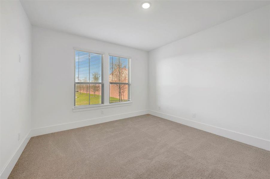 Spacious, unfurnished interior of a new home in Kreymer at the Park, Wylie (Image 26).