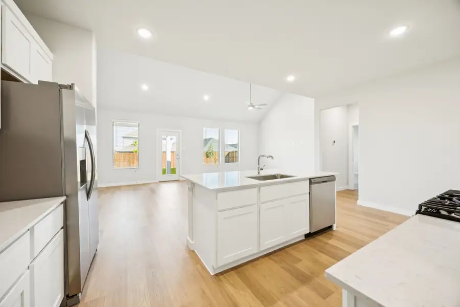 Kitchen in the Masters home plan by Trophy Signature Homes – REPRESENTATIVE PHOTO Kitchen in the Masters home plan by Trophy Signature Homes – REPRESENTATIVE PHOTO