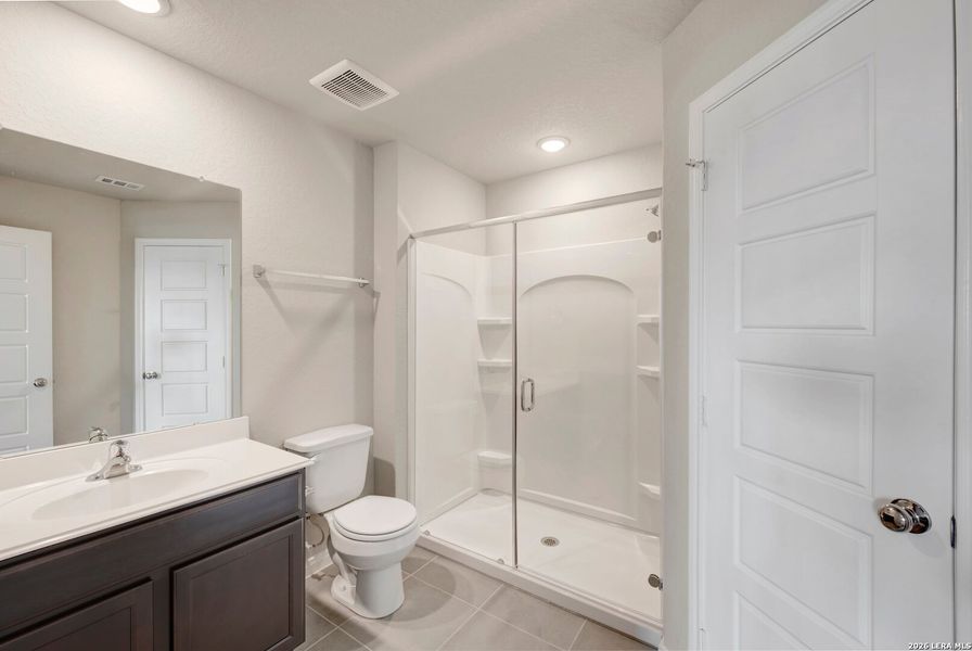 Furnished interior view inside a new home in Greenspoint Heights, Seguin (Image 6).