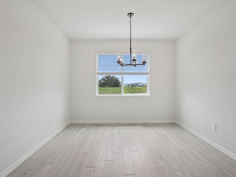 Spacious, unfurnished interior of a new home in The Grove at Stuart Crossing - Signature Series, Bartow (Image 8).