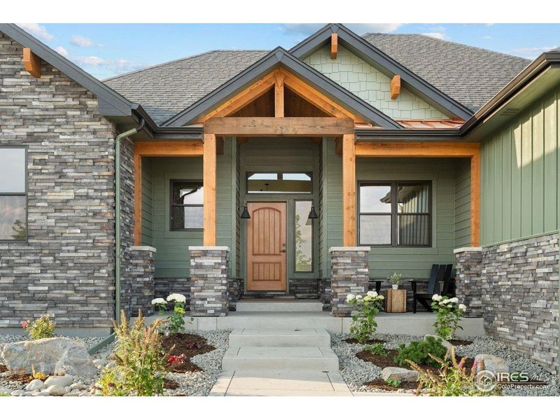Exterior details and patio area of a home in Harvest Ridge, Berthoud (Image 28).