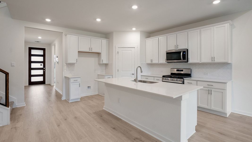 Furnished interior view inside a new home in Prairie Oaks, Oak Point (Image 9).