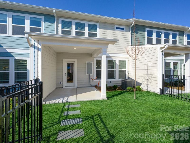 Exterior details and patio area of a home in North Creek Village, Huntersville (Image 21).