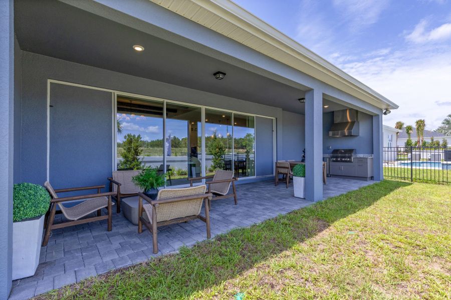 Representative exterior details of a home built from the Merlot Grand by Pulte Homes in Lakehaven Estates, Clermont (Image 2). Representative exterior details of a home built from the Merlot Grand by Pulte Homes in Lakehaven Estates, Clermont (Image 2).