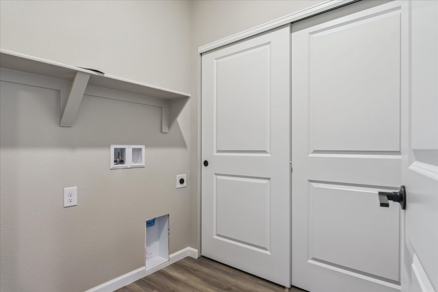 A white wall with white doors.