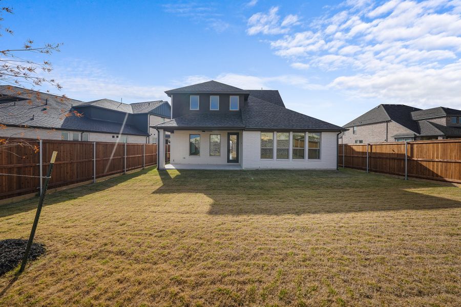 Exterior details and patio area of a home in Aster Park, McKinney (Image 24).