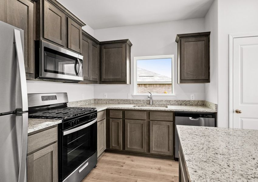 The kitchen has has a wonderful window over the sink. The kitchen has has a wonderful window over the sink.