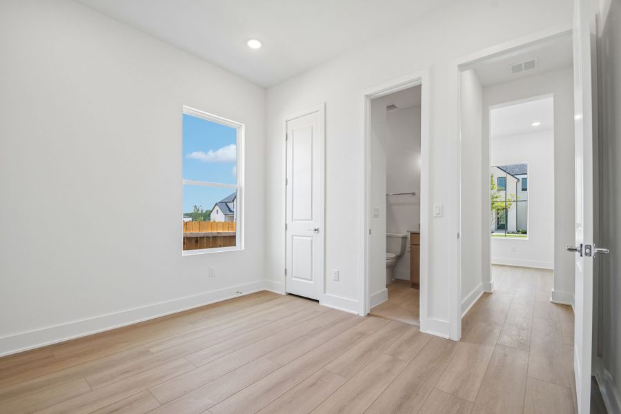 Spacious, unfurnished interior of a new home in Freedom at Anthem, Kyle (Image 21).