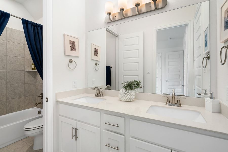 Representative furnished interior of a home built from the Mason by UnionMain Homes in Edgewater, Fate (Image 6).