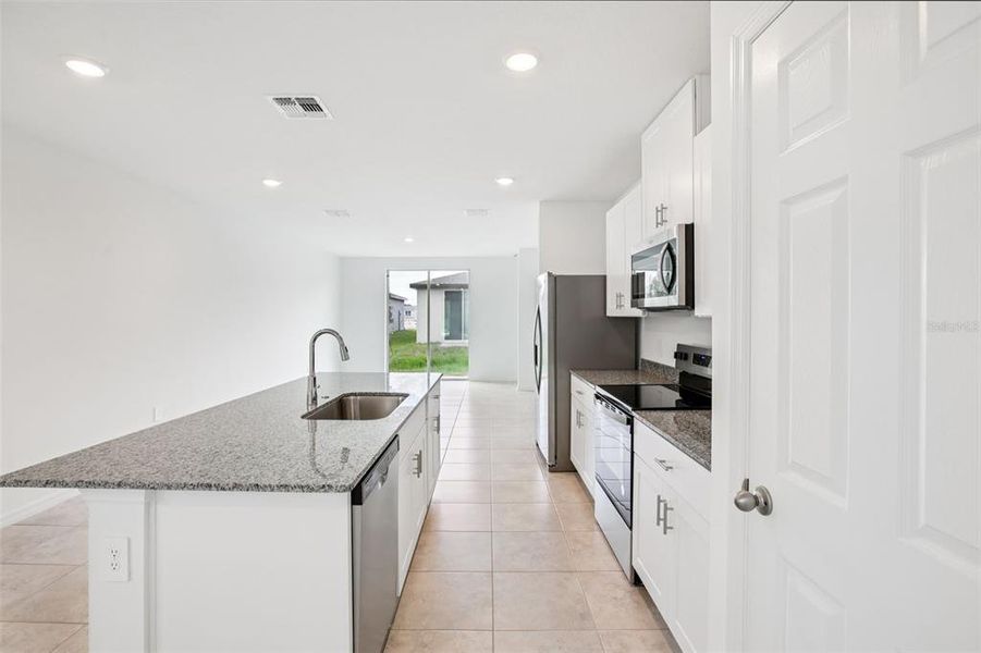 Furnished interior view inside a new home in Villamar - Classic Series, Winter Haven (Image 6).