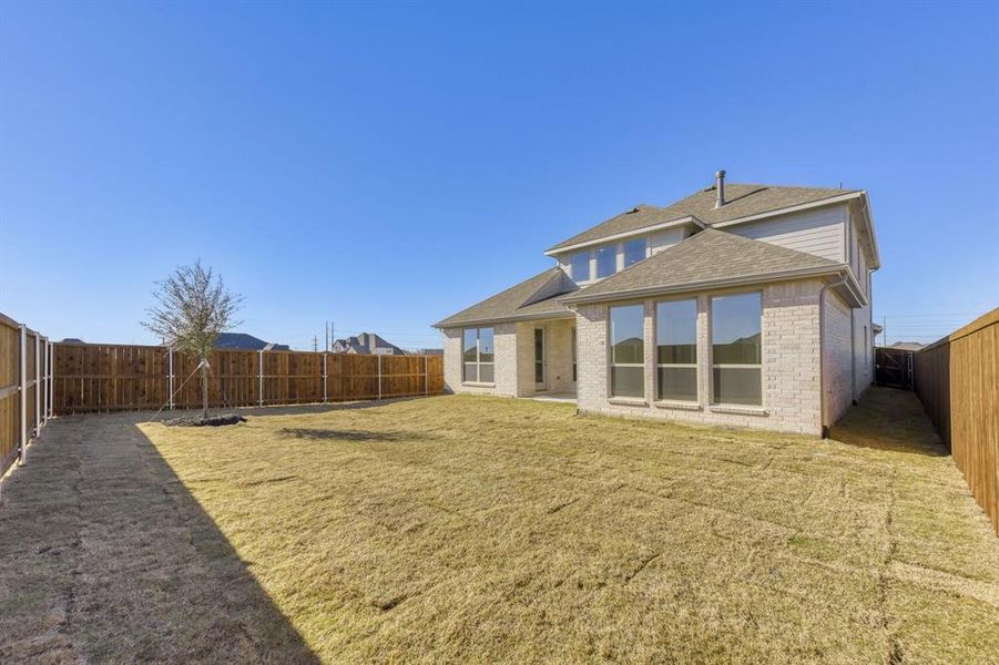 Exterior details and patio area of a home in Wellington, Haslet (Image 3).