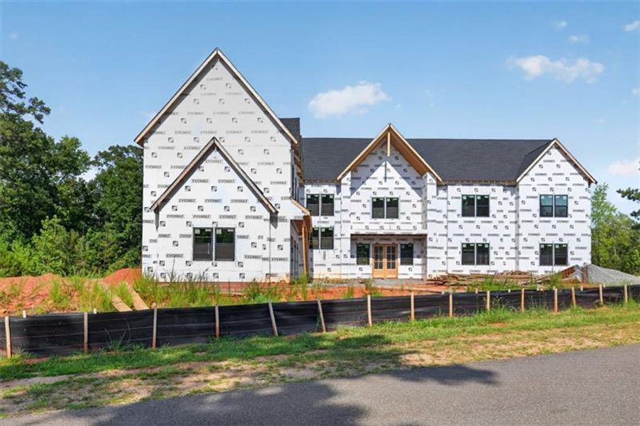 Front exterior of a new home in , Monticello, GA, highlighting curb appeal (Image 10).