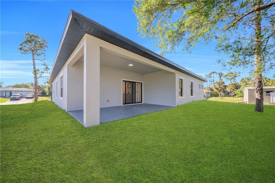 Exterior details and patio area of a home in , North Port (Image 3).