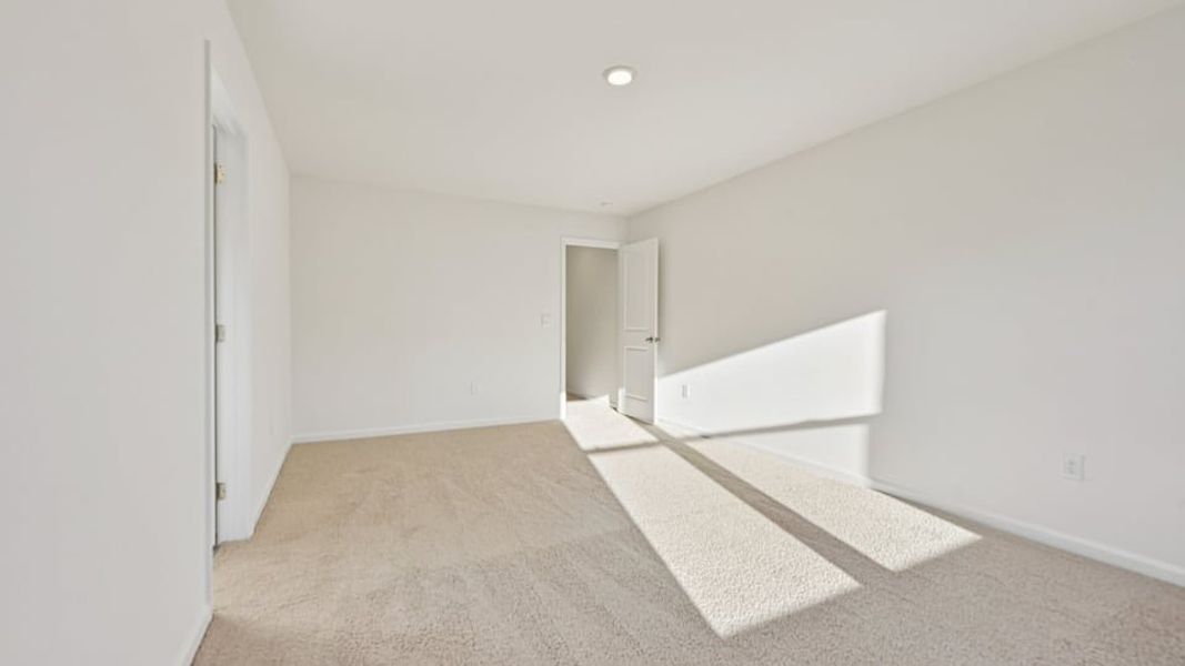 Spacious, unfurnished interior of a new home in Chapel Townes, Raleigh (Image 22).