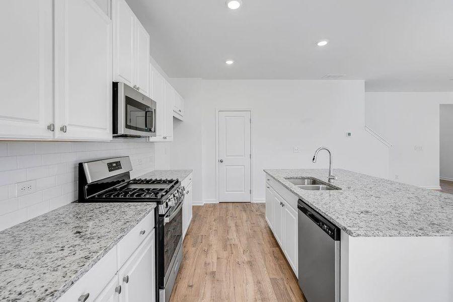 Furnished interior view inside a new home in Windance Lake, Loganville (Image 7).
