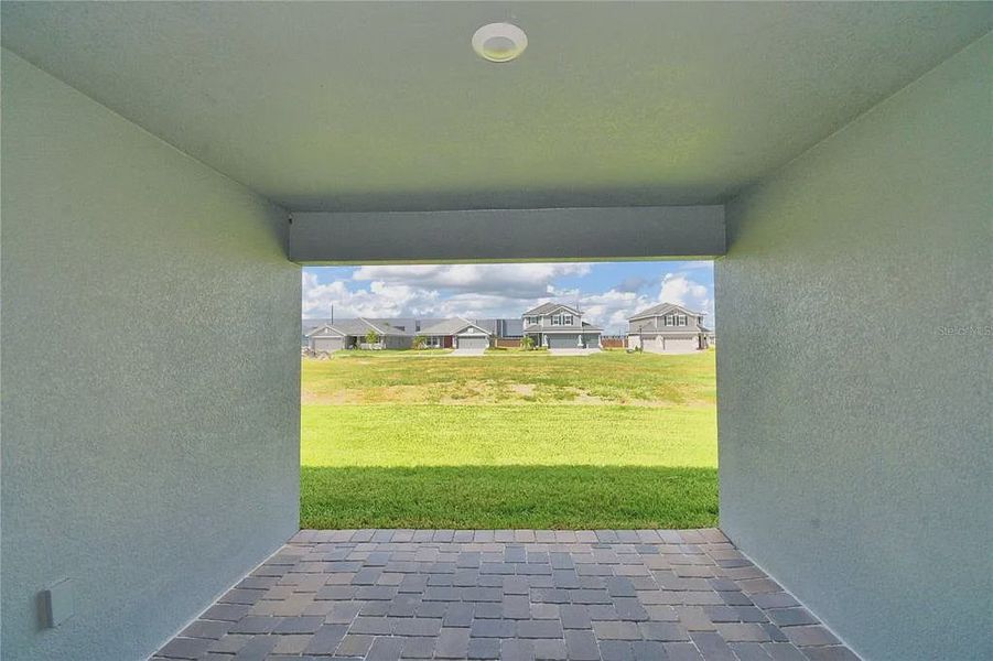 Exterior details and patio area of a home in Lake Juliana Estates, Auburndale (Image 3).